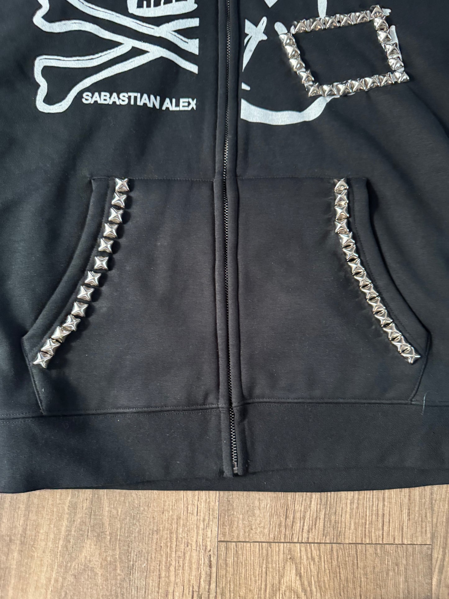 STUDDED CROSSBONE ZIP-UP