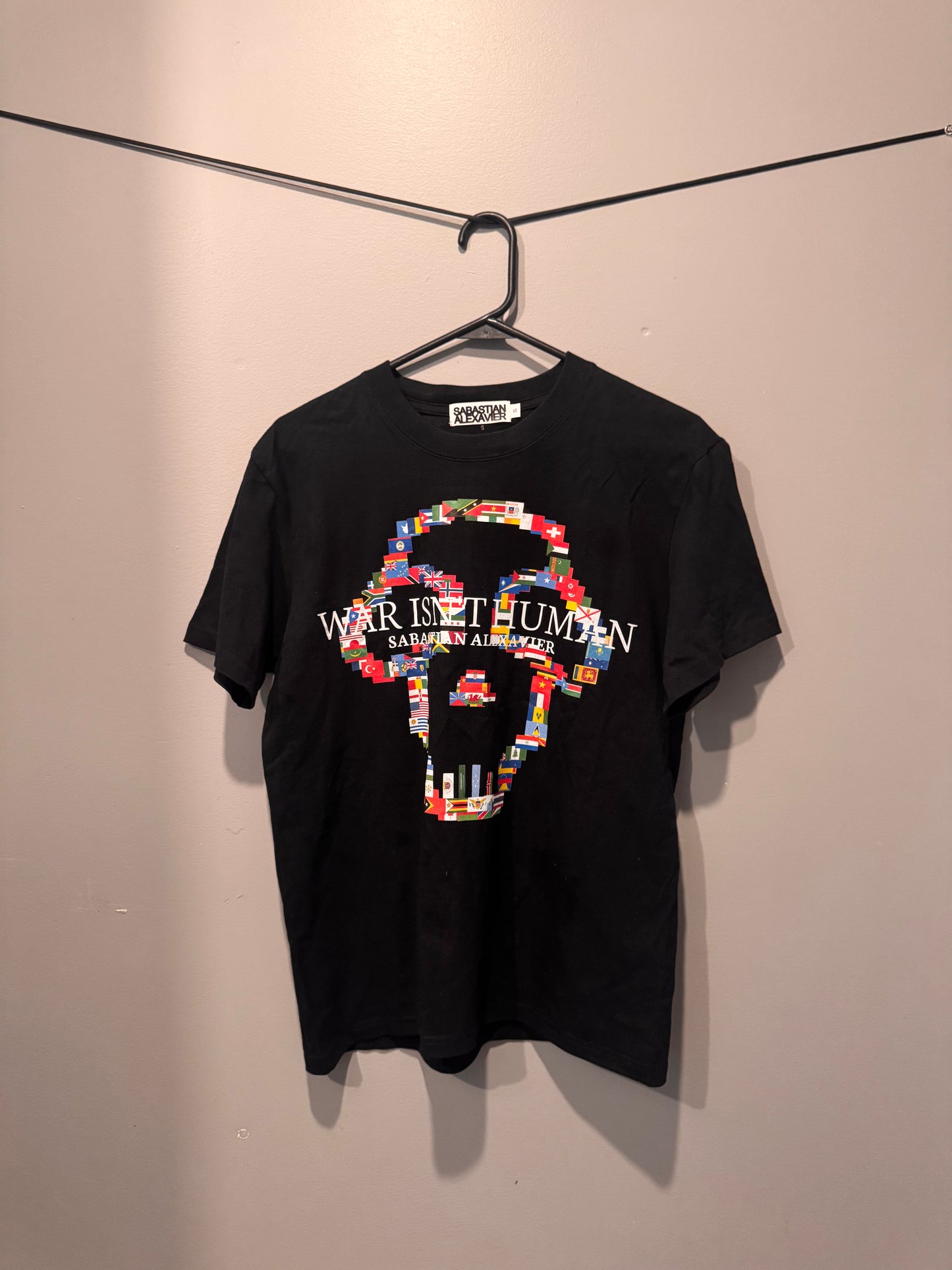 WAR ISNT HUMAN TSHIRT